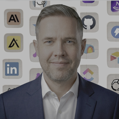 HDR-encoded founder profile photo: the white shirt and background render brighter than the LinkedIn page white on HDR screens